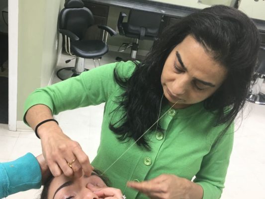 Eyebrow threading, threading, brow shaping, brow correction